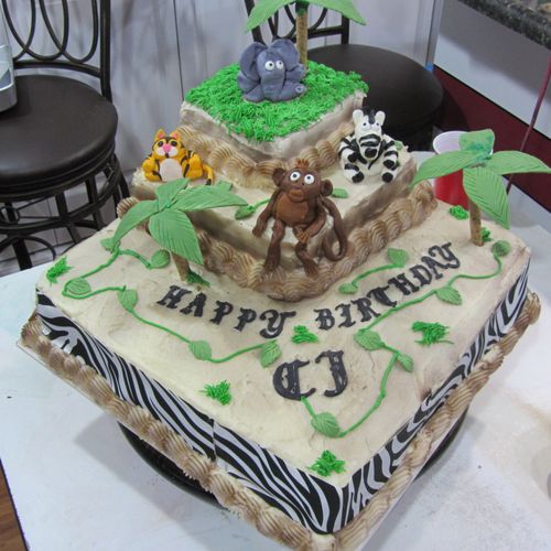 Zoo animal Jungle cake made with buttercream and f