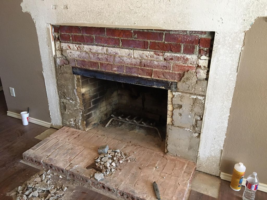 Before photo of fireplace renovation.