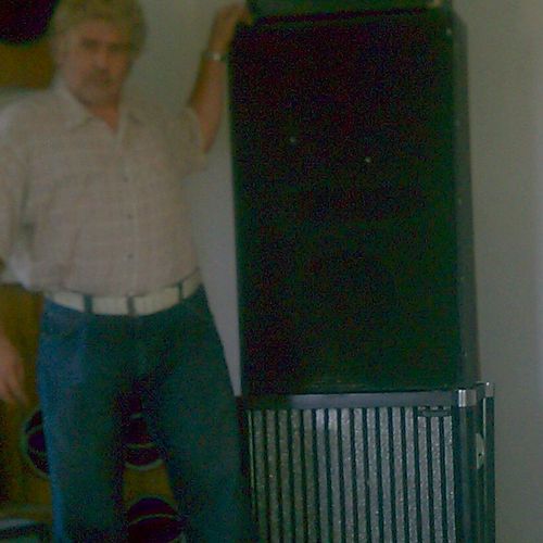 Myself owner and accordian amp setup using wood re