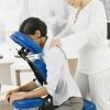 Chair Massage is performed in a specially designed