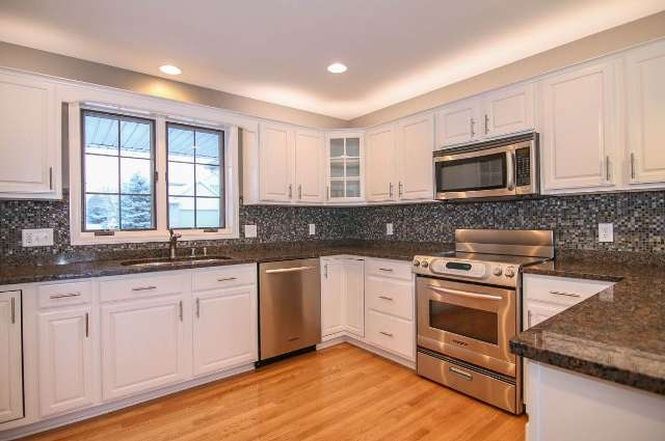 Cabinets that I sprayed white - they used to be go