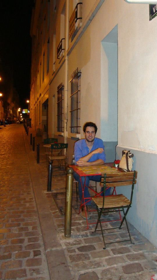 Sitting at a street cafe in Paris.
