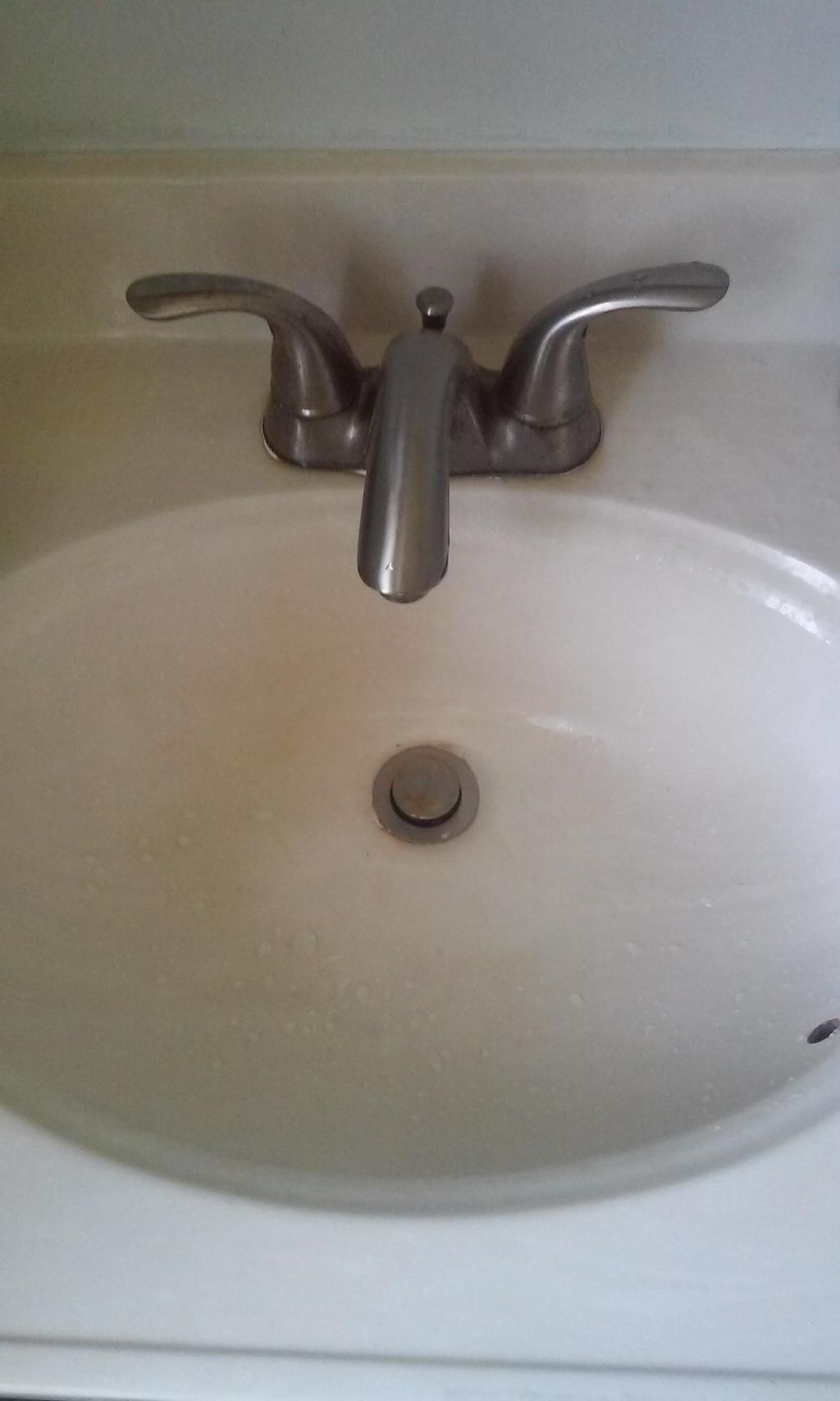 Bathroom sink after cleaning.