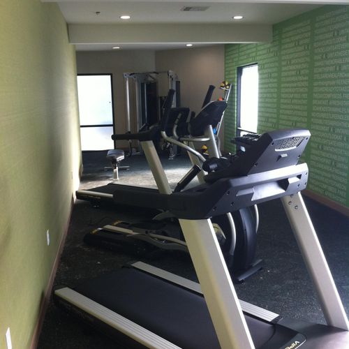 Hotel renovation. Gym equipment assembly and place