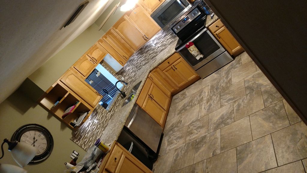 backsplash and porcelain 18 x 18 tile on a stagger