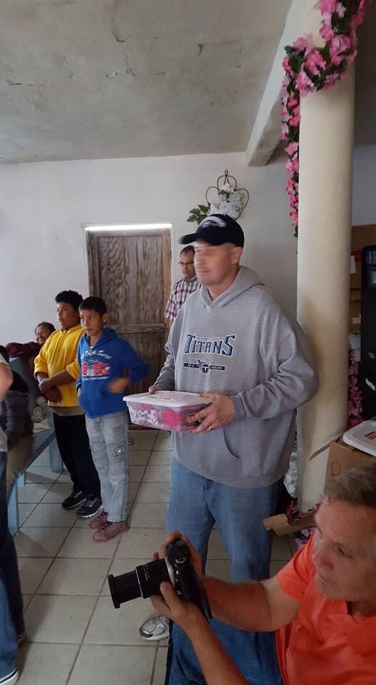 Passing out presents to the children on the Island