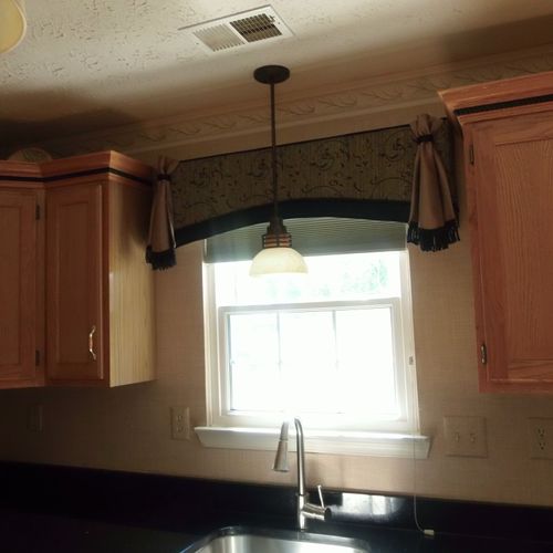 Kitchen remodeled design featuring custom window t