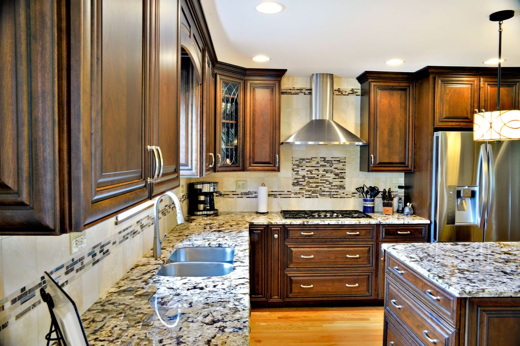 Kitchen cabinets. Counter tops. Lighting. Flooring