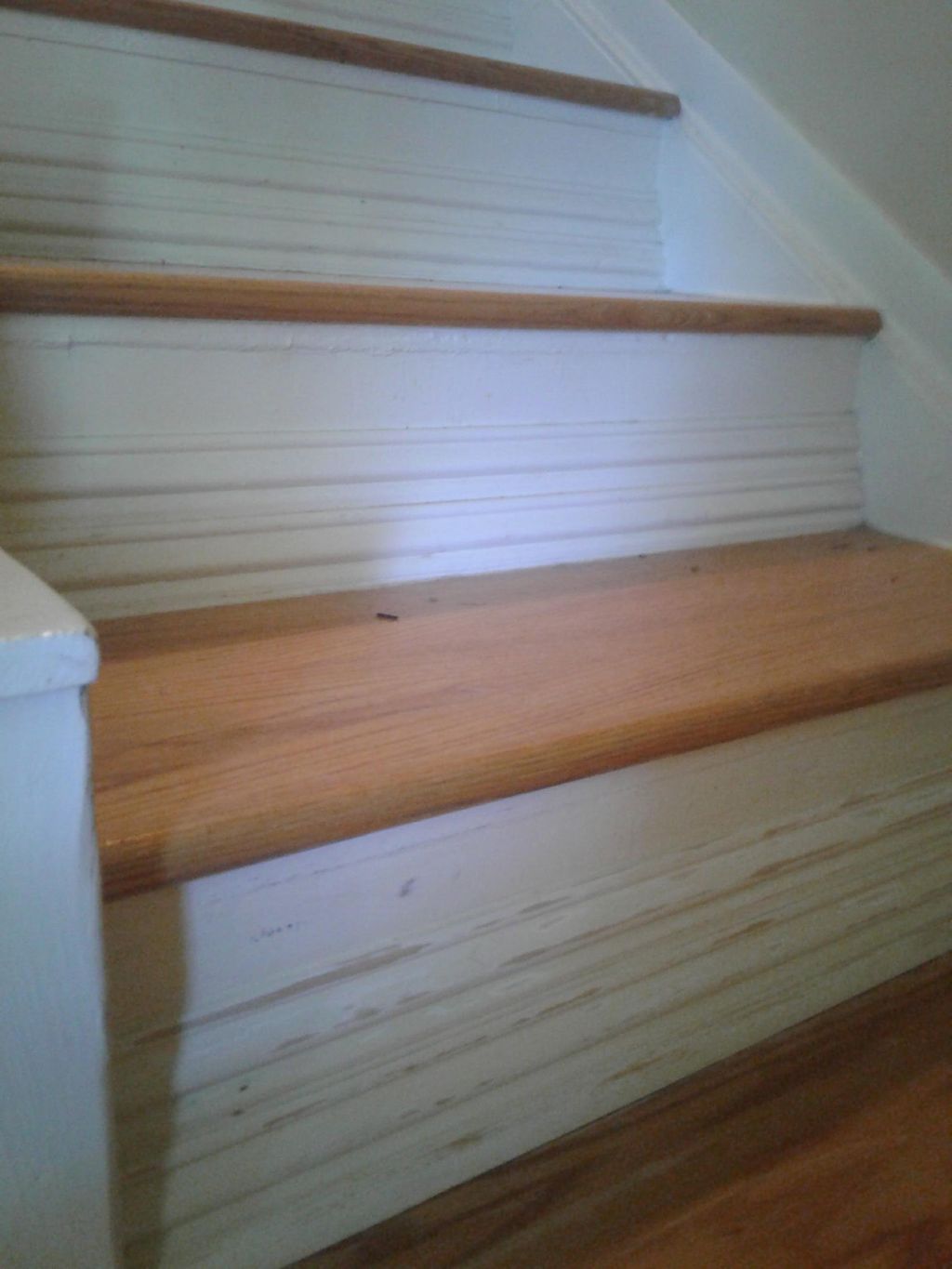 Paint is partly stripped,  sanding creates distres