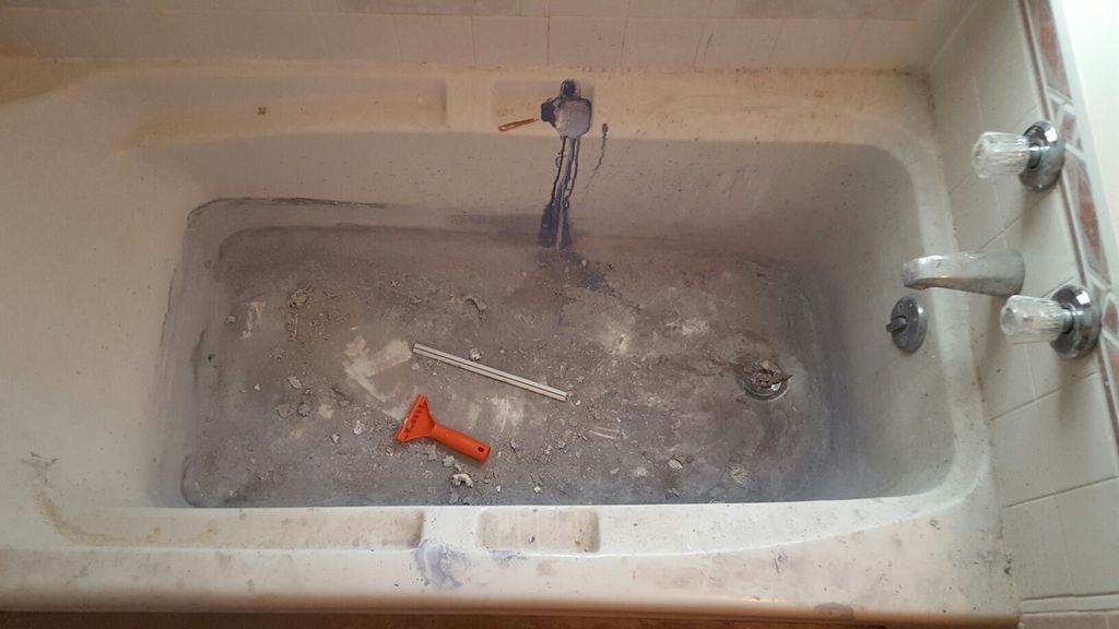 Paint from a painter using customers tub to clean 