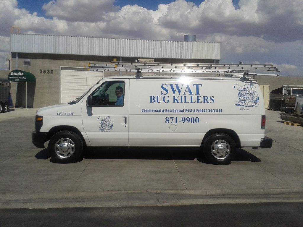 ONE OF SWATS PIGEON SERVICE VANS.