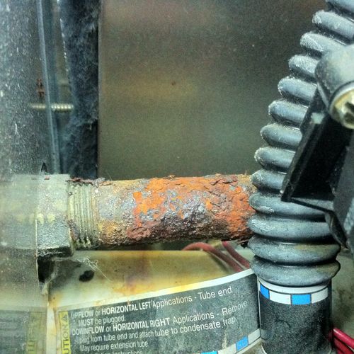 Rusted gas inlet pipe into furnace burner - danger