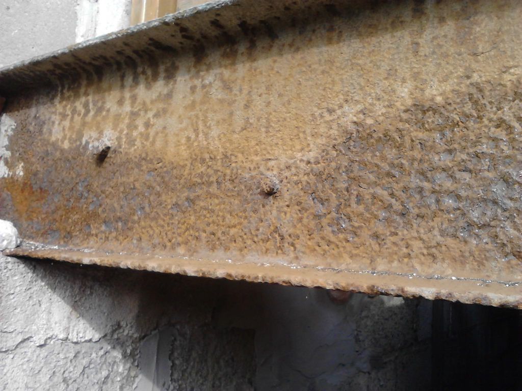 Structural steel I beam in concrete block structur