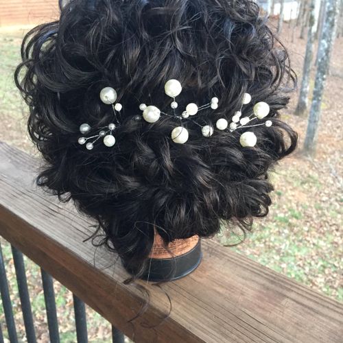 Spiral curl updo. Would be beautiful to enhance na