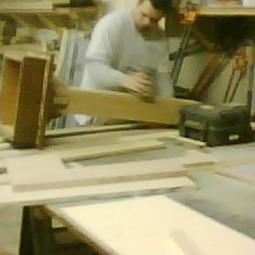 Carpenter A.J. Berrios at work in shop