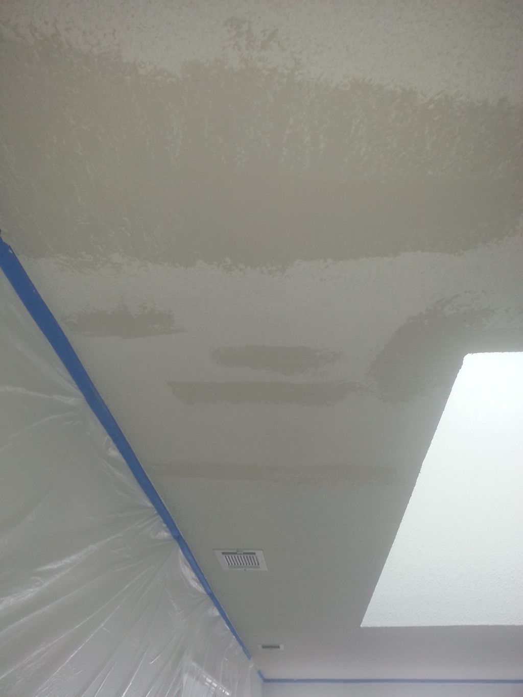 BEFORE-patched ceiling cracks and were texture was