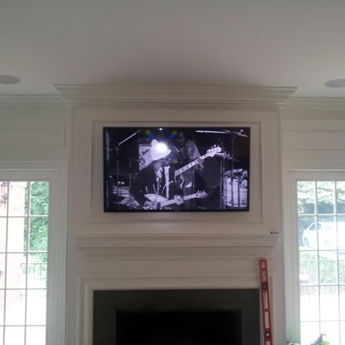 Mounted the TV above the fire place, and installed