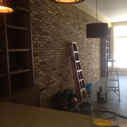 Brick tiles and built in custom cabinets