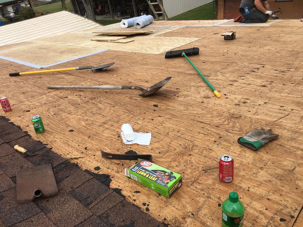 replacing rotten wood before new shingles are appl