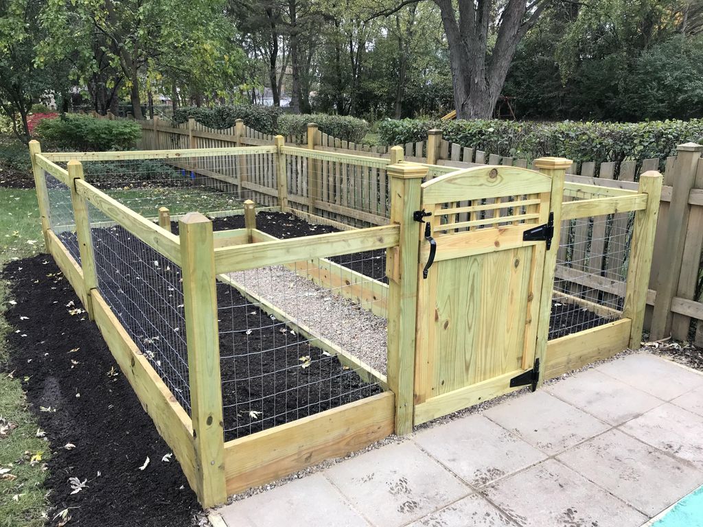 Left Corner 9x16x4 foot tall gated and stone path 