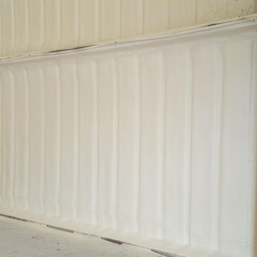 Closed cell foam on metal building 
