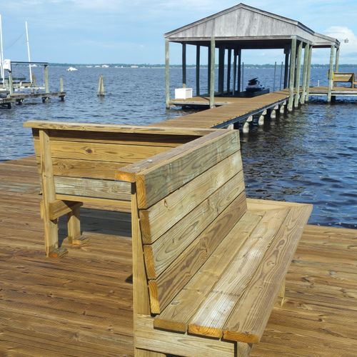 Dock repair with new walk boards and benches 