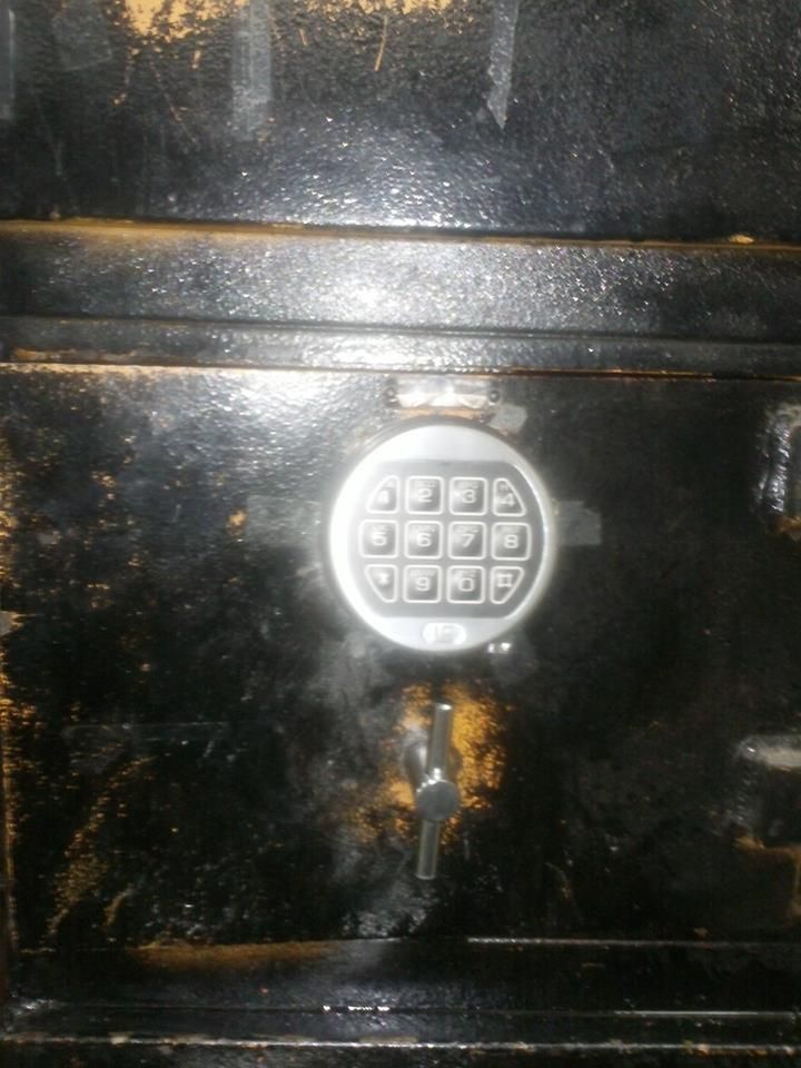 safe drilled open and replaced combo dial lock wit