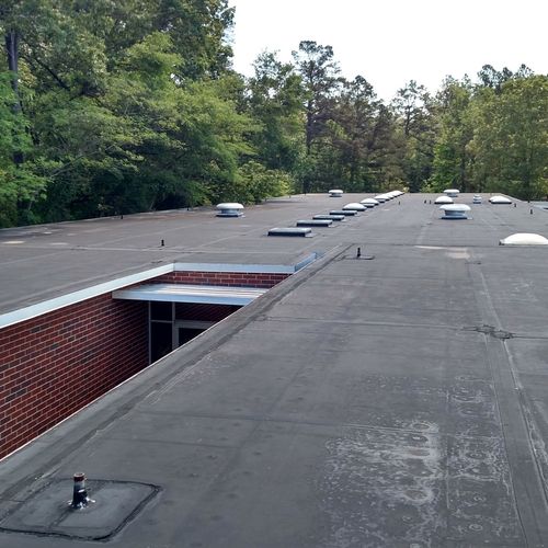 Elementary School with an old EPDM roof with subst