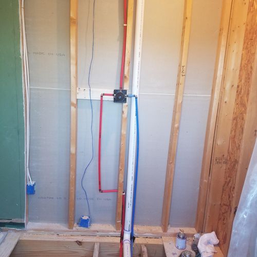 New water lines, drain, and shower valve for new s