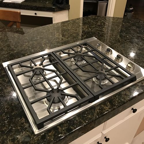 New Wolf gas cooktop installed and JenAire downdra