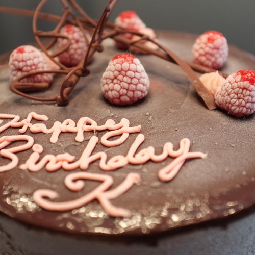 Gelato cake, layered with chocolate and raspberry 