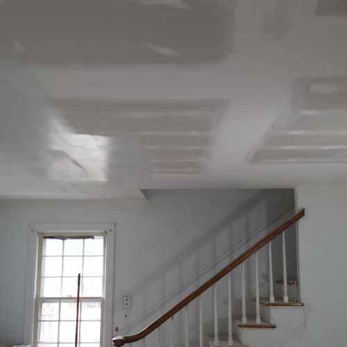 Living room ceiling repair. Freshly taped and fini