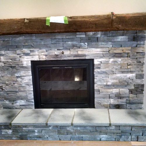 After makeover, cultured stone, hearth, new Thermo