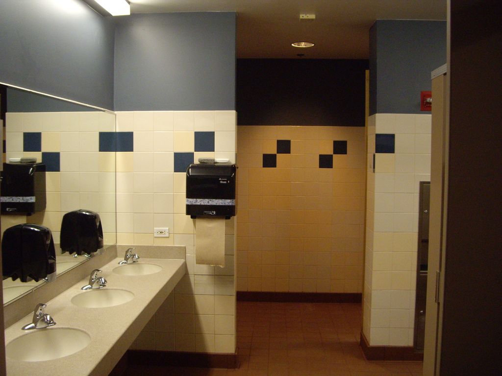 Commercial Bathroom Remodel:  Staron countertops w