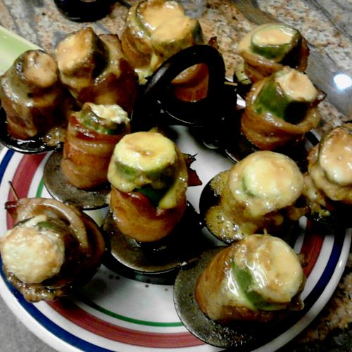 Bacon wrapped Jalapeños stuffed with Chèvre and ag