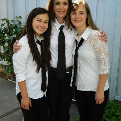 McCall With 2 of her students at a recital.