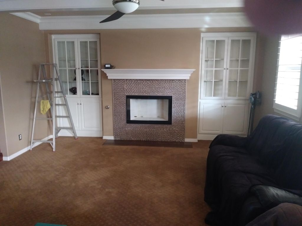 AFTER........... install mosaic tile around firepl