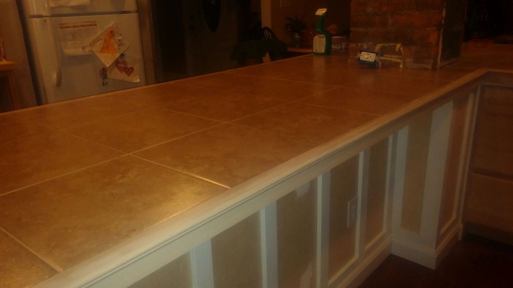 The customer decided on 13x13 ceramic tile.