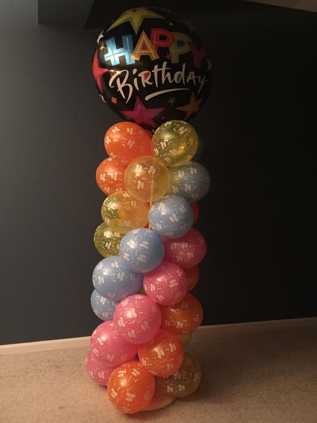 Column with 36" mylar balloon on top