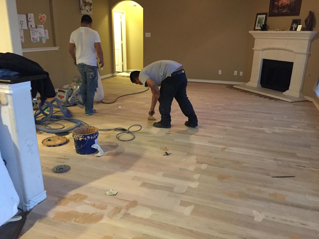 Water Damage Repair to hardwood flooring in McKinn