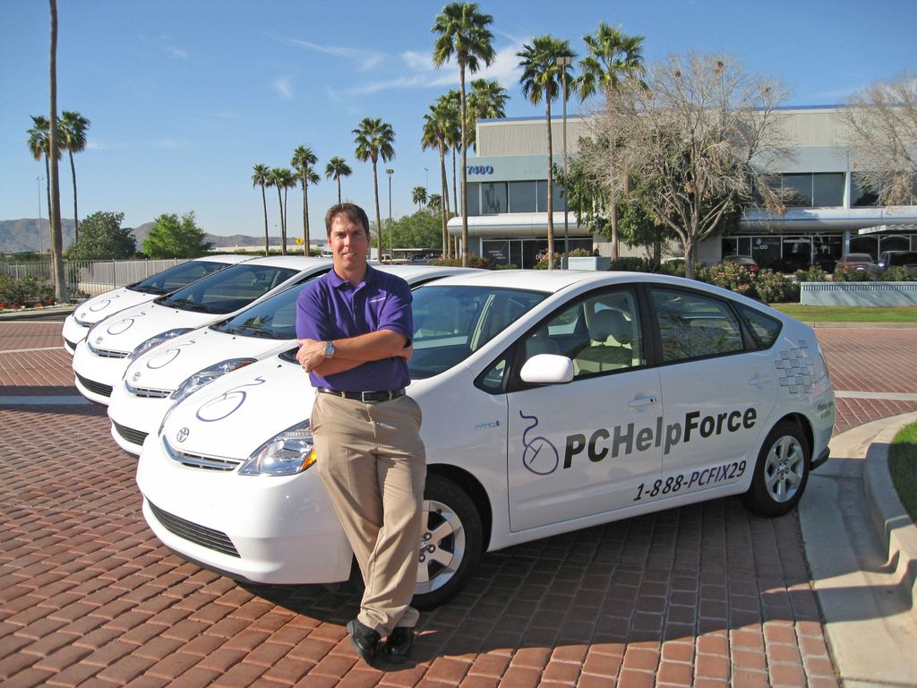 Owner David in front of the mobile tech cars.