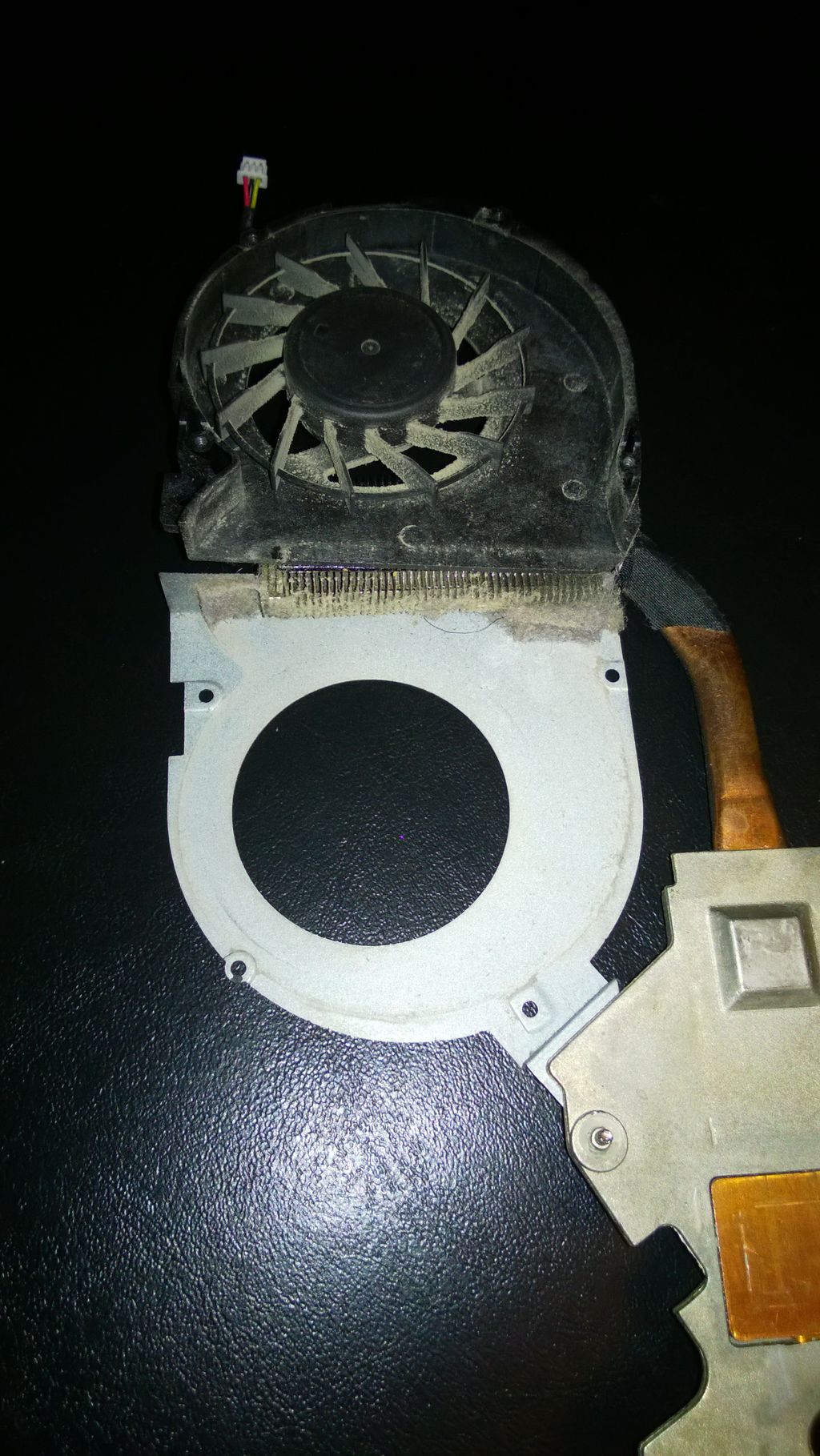 Dust Blocked Laptop Fan & Vent (Before Cleaning)