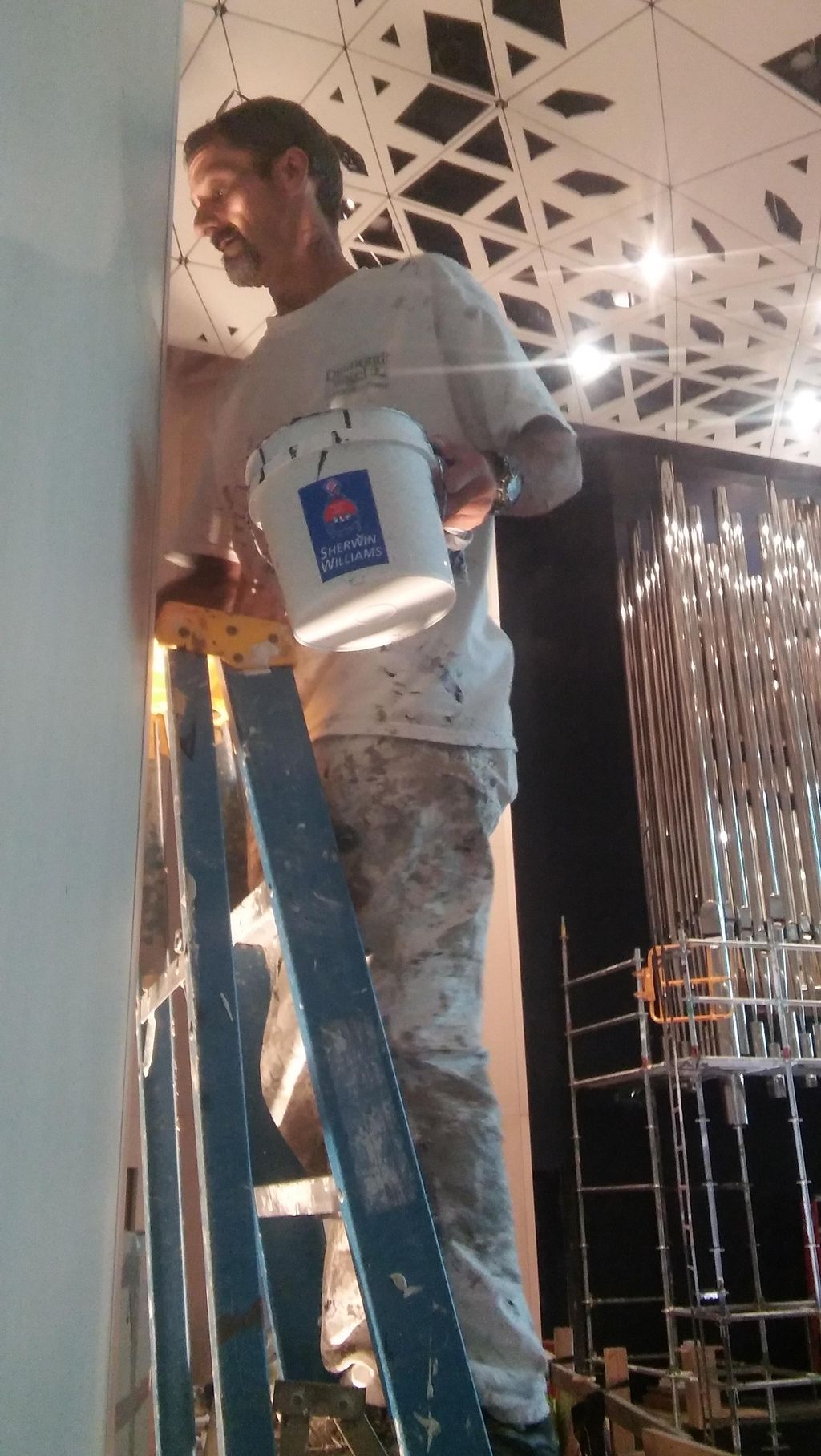 Dane painting the University of Iowa School of Mus