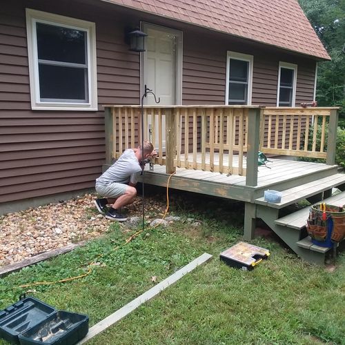 adding railings to an existing deck.