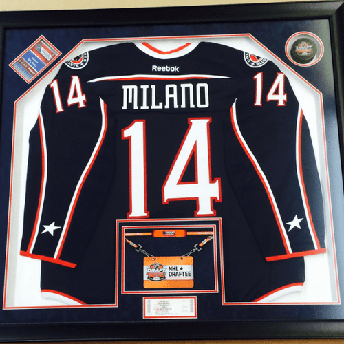 Custom Framed Jersey with addition of hockey puck,