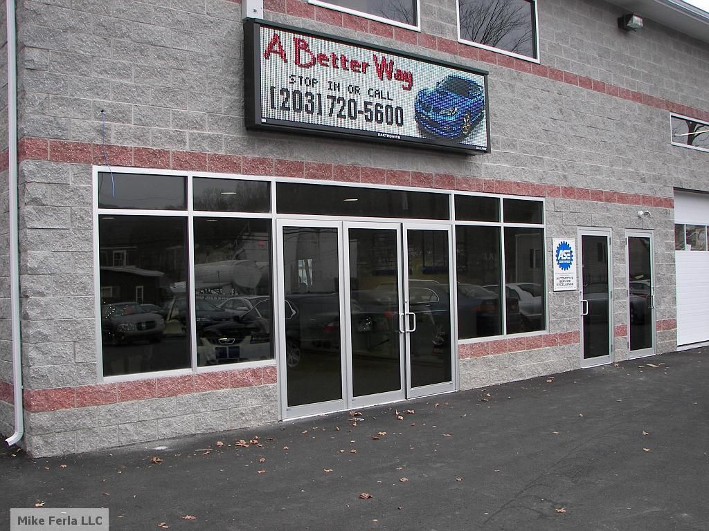 Mill finish storefront with Solar tinted glass.