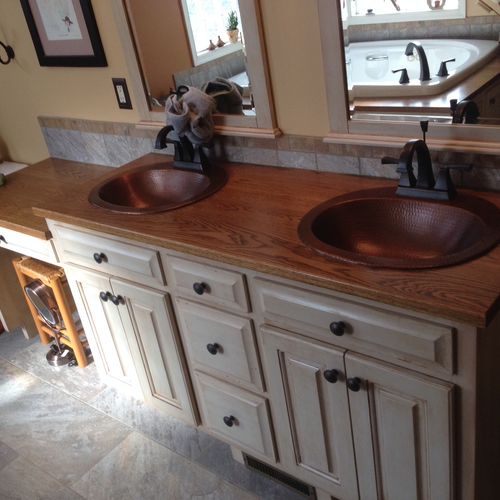 Refinished vanity with stained solid oak counterto