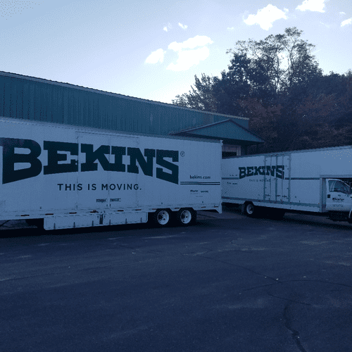 Two of our trucks long-distance trucks loading at 