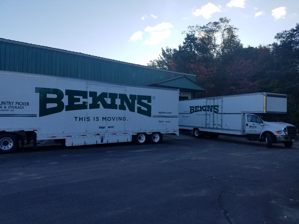 Two of our trucks long-distance trucks loading at 