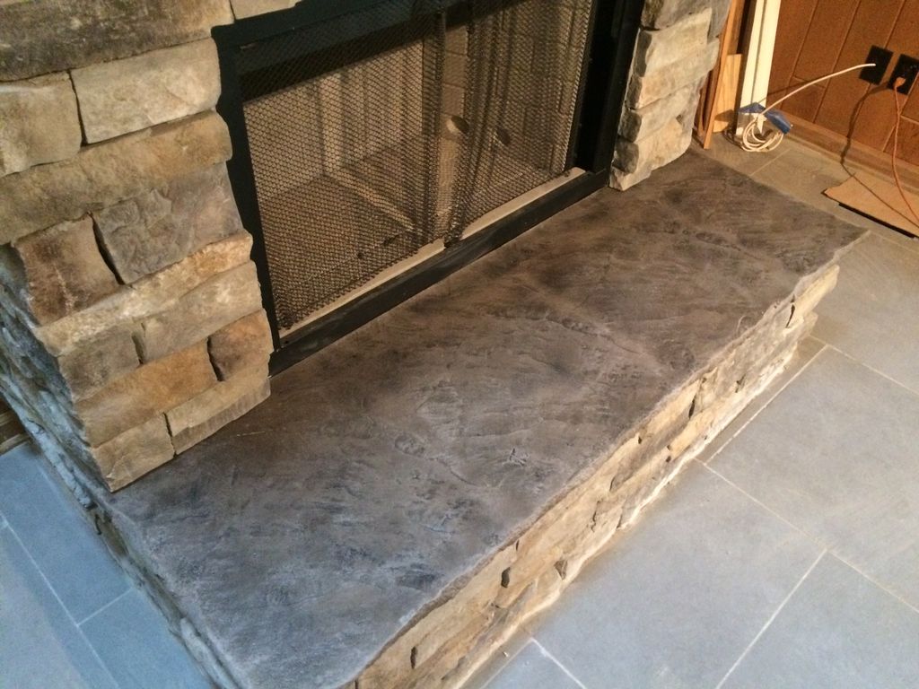 Poured and stained concrete hearth.